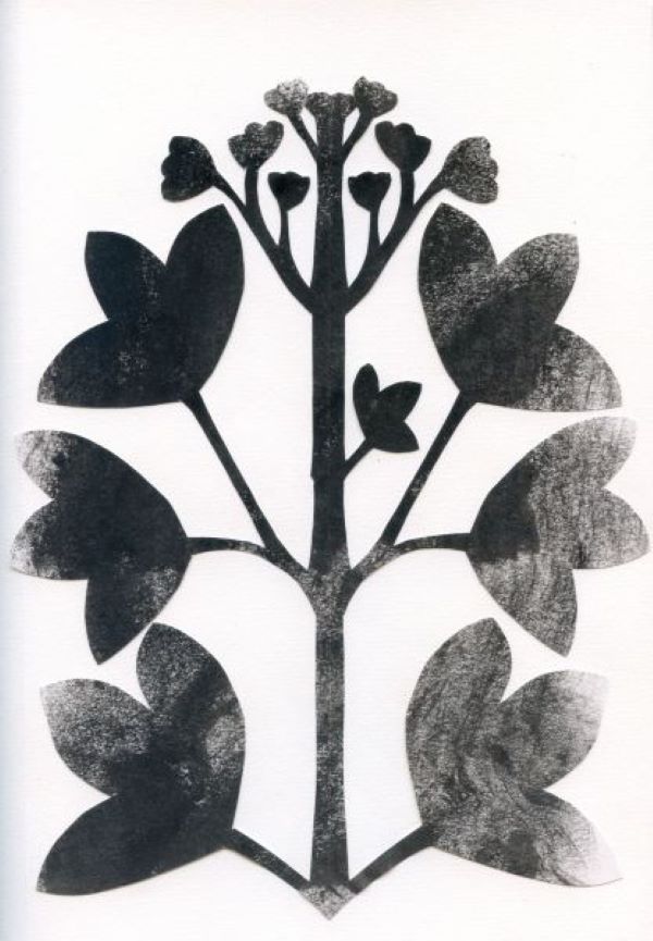 Textured black paper cut-out of a stem with leaves and flowers